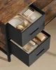 Close-up of two drawers of a desk, showing office supplies and personal items. Náhled obrázku produktu