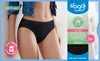 A woman wearing black Sloggi underwear, with marketing text and logos on the right side. Produktbild-Vorschau