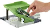 A hand is placing a toy bus onto a toy bus station ramp. Náhľad obrázku produktu