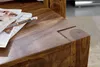 A close-up of a wooden table with a pencil and papers on it. Produktbild-Vorschau