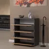 A modern shoe cabinet with four flip-down drawers is shown in a room setting, next to an umbrella stand. Produktbild-Vorschau
