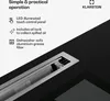 A close-up marketing image of a retractable downdraft range hood, with text overlays highlighting its features and the brand logo. Náhľad obrázku produktu