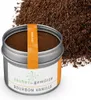 A tin of Bourbon vanilla spice with a pile of vanilla spice in the background. Produktbild-Vorschau