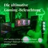 A person is gaming in a room with green neon lights and multiple monitors. Produktbild-Vorschau
