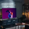 A modern living room setup featuring a large television displaying a vibrant image, with a media console and decorative items. Produktbild-Vorschau