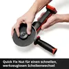A person's hands are shown adjusting a grinding disc on an angle grinder. Produktbild-Vorschau