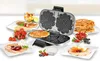 A waffle maker with various waffles and toppings laid out around it. Produktbild-Vorschau