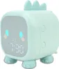 A cute mint green dinosaur-shaped alarm clock with a digital display showing 7:30. Produktbild-Vorschau