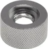 A close-up, studio shot of a metal nut with knurled edges. Náhled obrázku produktu