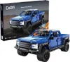 A product box for a blue off-road toy truck, with a smaller image of the assembled toy truck in the foreground. Náhľad obrázku produktu