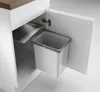 A white kitchen cabinet with a pull-out trash bin system. Anteprima dell’immagine prodotto