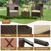 A set of outdoor furniture, including two chairs and a small table, placed on a lawn. Produktbild-Vorschau