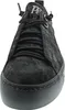 A close-up front view of a black sneaker with a platform sole. Produktbild-Vorschau