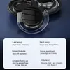 Close-up of black wireless headphones with a clear ear hook, placed on a dark blue surface. A white informational panel with text and instructions is visible at the bottom. Náhled obrázku produktu
