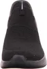 A close-up, front-facing view of a black Skechers slip-on sneaker. Náhľad obrázku produktu