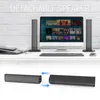 A computer setup with a monitor and two detachable speakers, with a separate image showing the speakers detaching. Produktbild-Vorschau