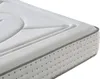 A close-up, angled view of a white mattress with gray piping and a subtle dotted pattern on its side. Produktbild-Vorschau
