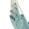 A close-up view of a teal fabric hammock chair with white ropes, against a white background. Produktbild-Vorschau