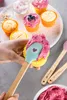 Mini grattoir en silicone avec manche en bois 3 pièces Voir les images du produit 3