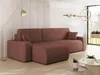 A modern living room with a sectional sofa, floor lamp, and coffee table.