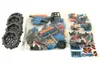 A collection of LEGO Technic parts and stickers, including wheels, building bricks, and a sticker sheet. Produktbild-Vorschau