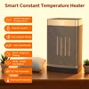 A heater is shown on a wooden table with some decorative elements like a small pillow and plants. The image highlights the product's features through text overlays. Produktbild-Vorschau