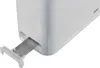 A close-up view of the side of a white toaster with the crumb tray extended. Náhled obrázku produktu