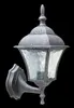 A vintage-style outdoor wall lamp with a black and silver finish and textured glass panels, set against a black background. Produktbild-Vorschau