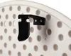 A close-up view of a black metal bracket attached to a white plastic surface with a pattern of circular indentations. Produktbild-Vorschau