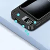 Close-up view of a black power bank with a digital display showing 100% charge. Náhled obrázku produktu