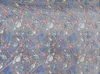 A flat lay of a blanket with a space-themed pattern. Náhled obrázku produktu