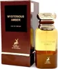 A perfume bottle and its box are displayed side-by-side against a white background. Produktbild-Vorschau