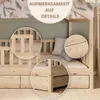 A close-up view of a wooden children's bed with drawers, featuring decorative wallpaper in the background and close-up insets highlighting construction details. Náhľad obrázku produktu