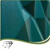 A close-up view of a textured, dark teal surface with geometric facets and shadows. Podgląd zdjęcia produktu