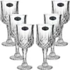A set of six crystal wine glasses with diamond-cut patterns and a black label on each glass. Podgląd zdjęcia produktu