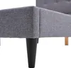 Close-up view of the legs and base of a grey upholstered bed frame. Voir les images du produit