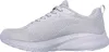 A side view of a gray and white athletic shoe. Voir les images du produit