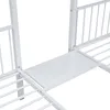 A close-up view of a white metal bunk bed frame, showing a shelf attached to the side of the upper bunk. Produktbild-Vorschau