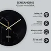 A black marble-patterned wall clock with gold hands, presented with descriptive text and icons highlighting its features. Anteprima dell’immagine prodotto