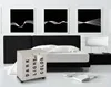 A bedroom scene with a bed, laundry basket, and artwork. Produktbild-Vorschau