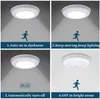 A collage of four images showing the features of a motion-sensing LED light. Produktbild-Vorschau