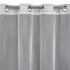Close-up of a white sheer curtain with grommets. Produktbild-Vorschau