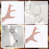 A collage of four images showing different cookie cutters and how they are held. Podgląd zdjęcia produktu