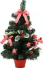 A small, decorated artificial Christmas tree in a red pot. Náhled obrázku produktu