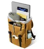A yellow backpack filled with various items, including a laptop, phone, books, and a water bottle. Náhled obrázku produktu