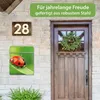 A house entrance with a mailbox and a house number. Produktbild-Vorschau