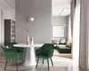 A dining set with chairs and a table in a modern living room setting, with a sofa and artwork visible in the background. Produktbild-Vorschau