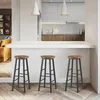 A modern kitchen with a white countertop and three bar stools. Produktbild-Vorschau