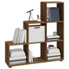 A brown wooden shelving unit with books and decorative items. Podgląd zdjęcia produktu
