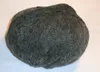 A ball of grey yarn on a white surface. Produktbild-Vorschau
